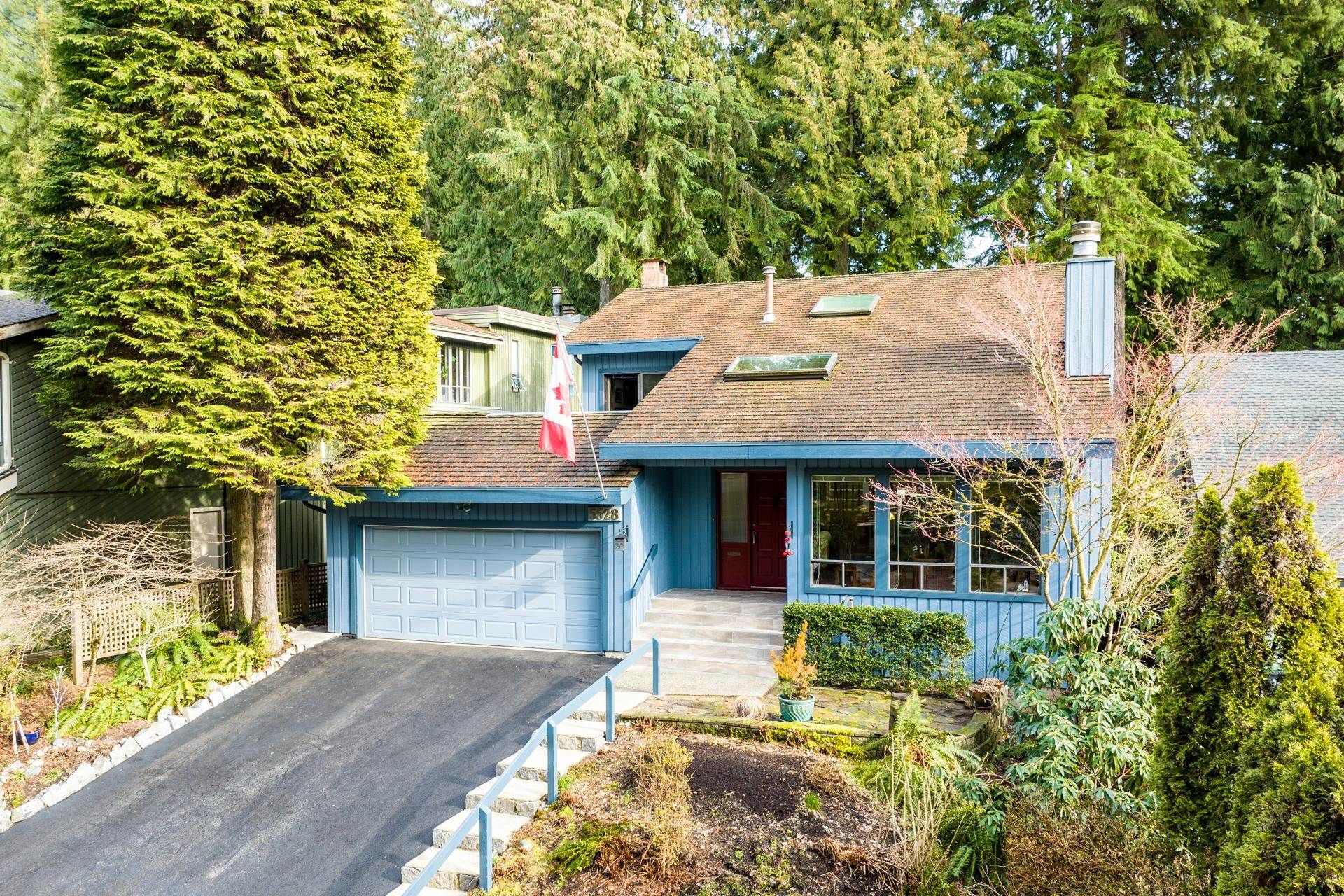 Main Photo: 5528 HUCKLEBERRY Lane in North Vancouver: Grouse Woods House for sale in "Grouse Woods" : MLS®# R2760387