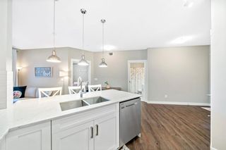 Photo 9: 106 110 Auburn Meadows View SE in Calgary: Auburn Bay Apartment for sale : MLS®# A1217350