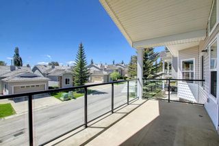 Photo 14: 404 Rocky Vista Gardens NW in Calgary: Rocky Ridge Row/Townhouse for sale : MLS®# A1229066