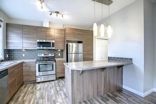 Photo 2: 148 130 New Brighton Way SE in Calgary: New Brighton Row/Townhouse for sale : MLS®# A1159288