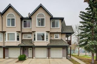 Photo 1: 9 Sandarac Way NW in Calgary: Sandstone Valley Row/Townhouse for sale : MLS®# A2050563