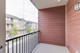 Photo 16: 214 Panatella Walk NW in Calgary: Panorama Hills Row/Townhouse for sale : MLS®# A1225557