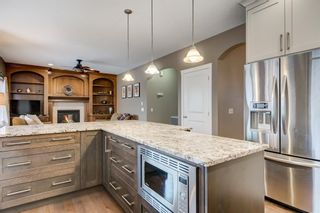 Photo 11: 62 Springborough Green SW in Calgary: Springbank Hill Detached for sale : MLS®# A1187965