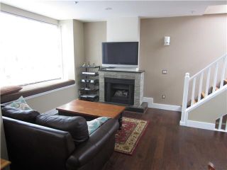 Photo 2: 204 665 W 7TH Avenue in Vancouver: Fairview VW Townhouse for sale in "THE IVYS" (Vancouver West)  : MLS®# V937208
