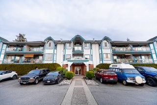 Photo 1: 202 5646 200 Street in Langley: Langley City Condo for sale in "Cambridge Court" : MLS®# R2749222