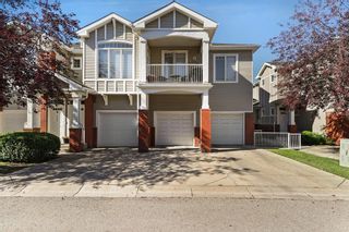 Photo 1: 406 8000 Wentworth Drive SW in Calgary: West Springs Row/Townhouse for sale : MLS®# A2002880