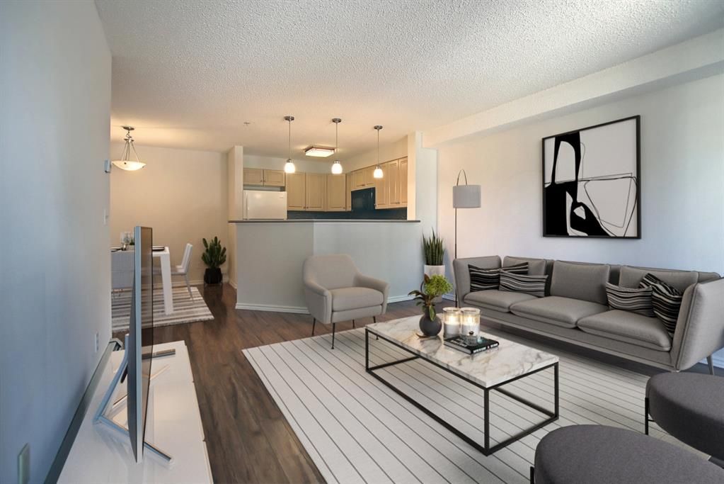Main Photo: 1124 10 Prestwick Bay SE in Calgary: McKenzie Towne Apartment for sale : MLS®# A1254028