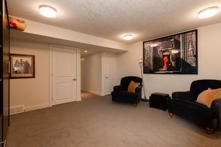 Photo 36: 100 Dieppe Drive SW in Calgary: Currie Barracks Row/Townhouse for sale : MLS®# A2034018