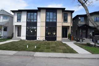 Main Photo: 440 23 Avenue NW in Calgary: Mount Pleasant Semi Detached (Half Duplex) for sale : MLS®# A2121034