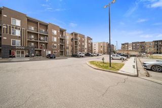Photo 3: 9208 403 Mackenzie Way SW: Airdrie Apartment for sale : MLS®# A1214920