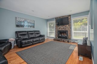 Photo 2: 2410 ORCHARD Drive in Abbotsford: Abbotsford East House for sale in "McMillan" : MLS®# R2687810