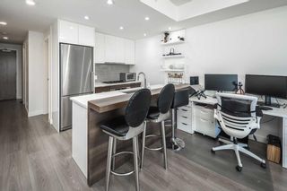 Photo 10: 402 118 Waterfront Court SW in Calgary: Chinatown Apartment for sale : MLS®# A2120171