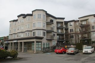 Photo 1: 412 5759 GLOVER Road in Langley: Langley City Condo for sale in "College Court" : MLS®# R2047493