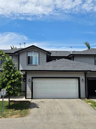 Main Photo: 24 102 Canoe Square SW: Airdrie Row/Townhouse for sale : MLS®# A2055051
