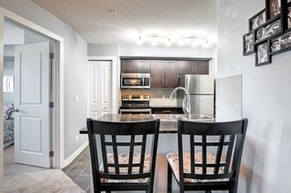 Photo 2: 6203 403 Mackenzie Way SW: Airdrie Apartment for sale : MLS®# A1256844
