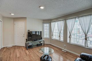 Photo 10: 20 Hidden Spring Place NW in Calgary: Hidden Valley Detached for sale : MLS®# A1205605