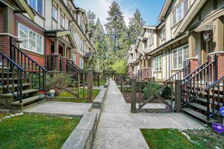Photo 2: 110 3333 DEWDNEY TRUNK Road in Port Moody: Port Moody Centre Townhouse for sale : MLS®# R2571062