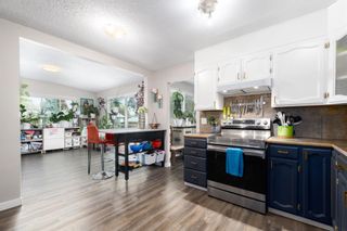 Photo 12: 412 Queen Charlotte Drive SE in Calgary: Queensland Detached for sale : MLS®# A2068913