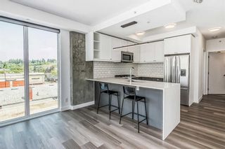 Main Photo: 512 327 9A Street NW in Calgary: Sunnyside Apartment for sale : MLS®# A2115253