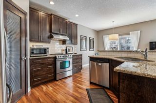 Photo 4: 67 Tremblant Way SW in Calgary: Springbank Hill Detached for sale : MLS®# A2120966