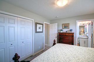 Photo 16: 212 Sunset Road: Cochrane Row/Townhouse for sale : MLS®# A1198532