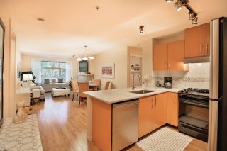 Photo 10: 102 400 KLAHANIE Drive in Port Moody: Port Moody Centre Condo for sale in "TIDES" : MLS®# R2013966