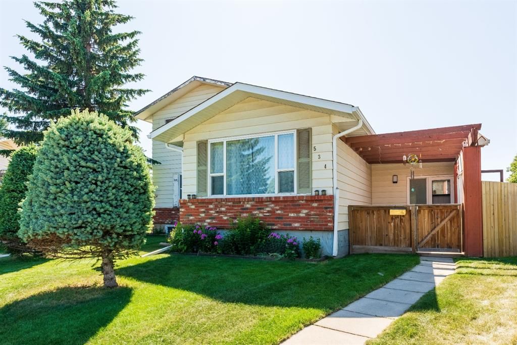 Main Photo: 534 QUEENSLAND Place SE in Calgary: Queensland Semi Detached for sale : MLS®# A1020359