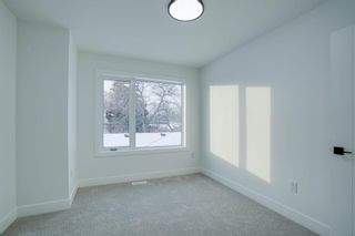 Photo 26: 907 Rundle Crescent NE in Calgary: Renfrew Semi Detached (Half Duplex) for sale : MLS®# A2025466