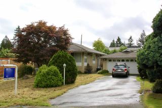 Photo 1: 7760 KENTWOOD Street in Burnaby: Government Road House for sale in "Government Road Area" (Burnaby North)  : MLS®# R2502117