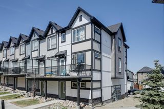 Photo 1: 404 16 Evanscrest Park NW in Calgary: Evanston Row/Townhouse for sale : MLS®# A2053096