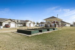 Photo 4: 4 SUNRISE Place: High River Row/Townhouse for sale : MLS®# A2043784