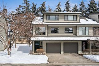 Photo 2: 5 140 Point Drive NW in Calgary: Point McKay Row/Townhouse for sale : MLS®# A2117738