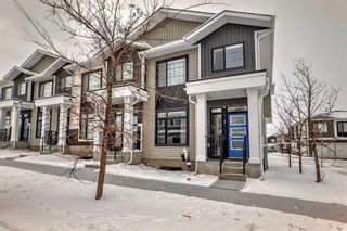 Main Photo: 47 Crestbrook Drive SW in Calgary: Crestmont Row/Townhouse for sale : MLS®# A2112844