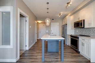 Photo 3: 310 100 Auburn Meadows Common SE in Calgary: Auburn Bay Apartment for sale : MLS®# A2002985