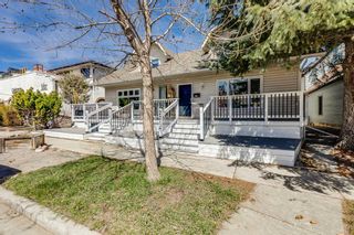 Main Photo: 2214 7 Avenue NW in Calgary: West Hillhurst Semi Detached (Half Duplex) for sale : MLS®# A2131533