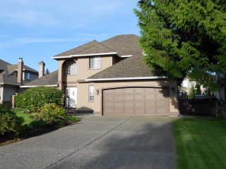 Photo 1: 6064 125TH Street in Surrey: Panorama Ridge House for sale in "BOUNDARY PARK" : MLS®# F1311634