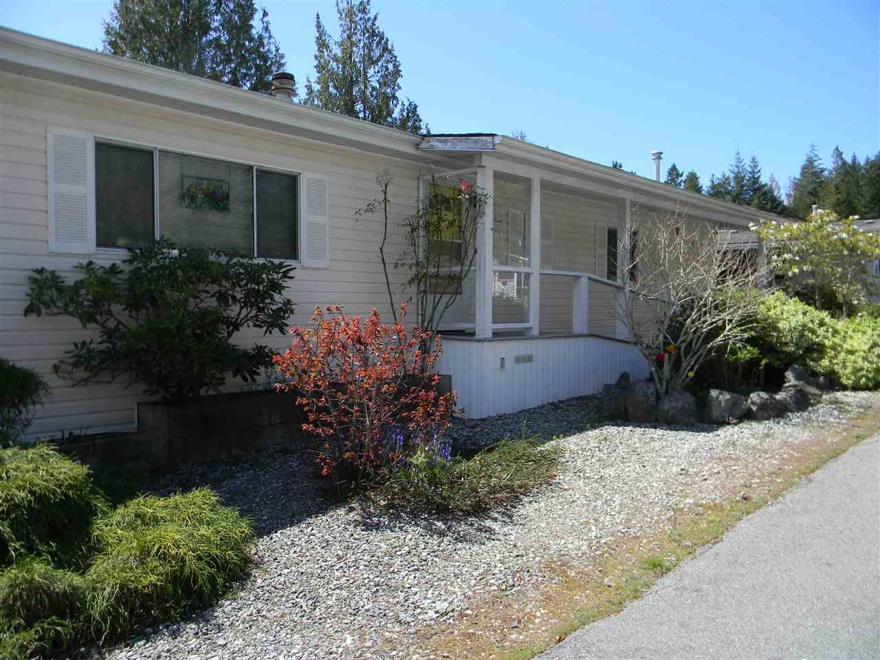 Sunny and bright one level double wide 2 bedroom, 2 full bath home in Rockland Wynd - one of the most desirable parks on the coast.