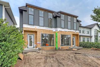 Photo 2: 1212 Richland Road NE in Calgary: Renfrew Semi Detached (Half Duplex) for sale : MLS®# A2064745