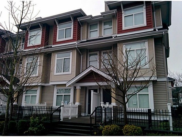 Main Photo: 5 8655 159TH Street in Surrey: Fleetwood Tynehead Townhouse for sale in "SPRINGFIELD COURT" : MLS®# F1406166