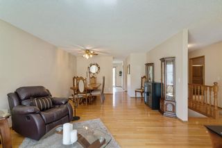 Photo 9: 21 Sandarac Circle NW in Calgary: Sandstone Valley Row/Townhouse for sale : MLS®# A2048786