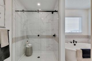 Photo 23: 67 Versant View SW in Calgary: C-163 Detached for sale : MLS®# A2122597