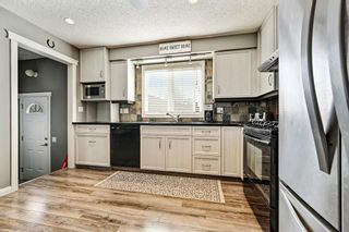Photo 8: 152 Woodside Circle SW in Calgary: Woodlands Detached for sale : MLS®# A1210402