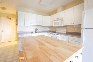 Photo 4: 212 5020 49 Street: Rocky Mountain House Apartment for sale : MLS®# A2072272