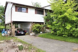 Photo 1: 7308 145 Street in Surrey: East Newton House for sale in "NEWTON" : MLS®# R2473387
