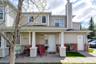 Photo 2: 1905 7171 COACH HILL Road SW in Calgary: Coach Hill Row/Townhouse for sale : MLS®# A1111553