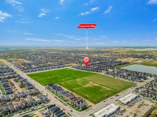 Photo 4: 427 Cornerstone Avenue NE in Calgary: Cornerstone Semi Detached (Half Duplex) for sale : MLS®# A2132213