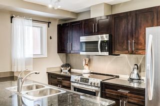 Photo 13: 2113 403 Mackenzie Way SW: Airdrie Apartment for sale : MLS®# A1163299