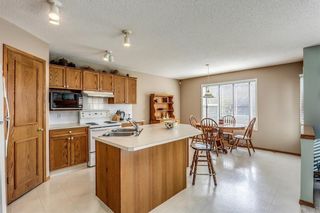 Photo 5: 66 MT BREWSTER Circle SE in Calgary: McKenzie Lake House for sale : MLS®# C4139419