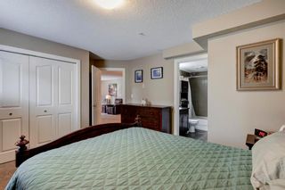 Photo 21: 1304 403 Mackenzie Way SW: Airdrie Apartment for sale : MLS®# A1220279