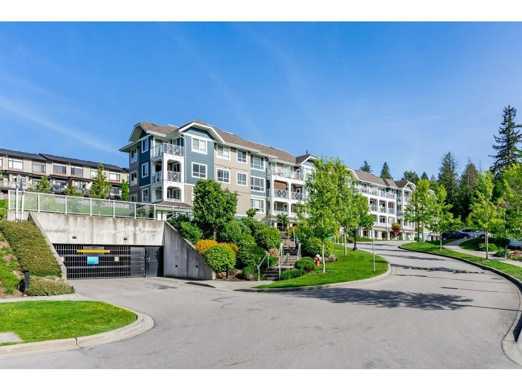 Main Photo: 304 16396 64 Avenue in Surrey: Cloverdale BC Condo for sale in "The Ridgse and Bose Farms" (Cloverdale)  : MLS®# R2579470